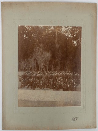 Collection including three large ensemble photographs of women from a well-known studio.